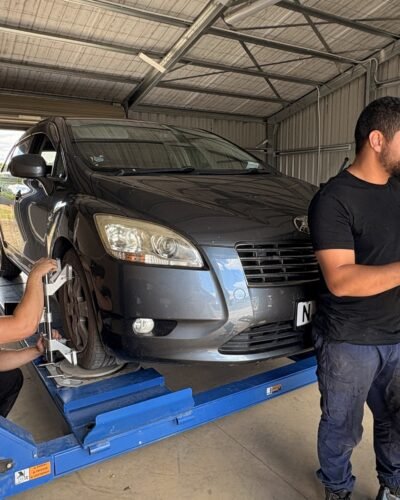 Wheel alignment being carried out on a car at Tyre Save Direct, Kerikeri