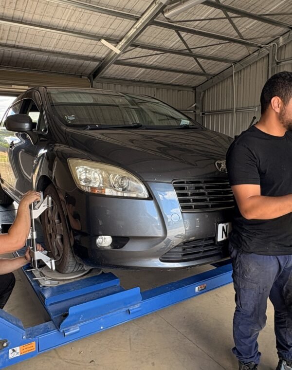 Wheel alignment being carried out on a car at Tyre Save Direct, Kerikeri
