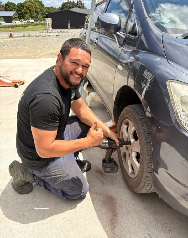 Wheel being removed with an impact wrench at Tyre Save Direct, Kerikeri